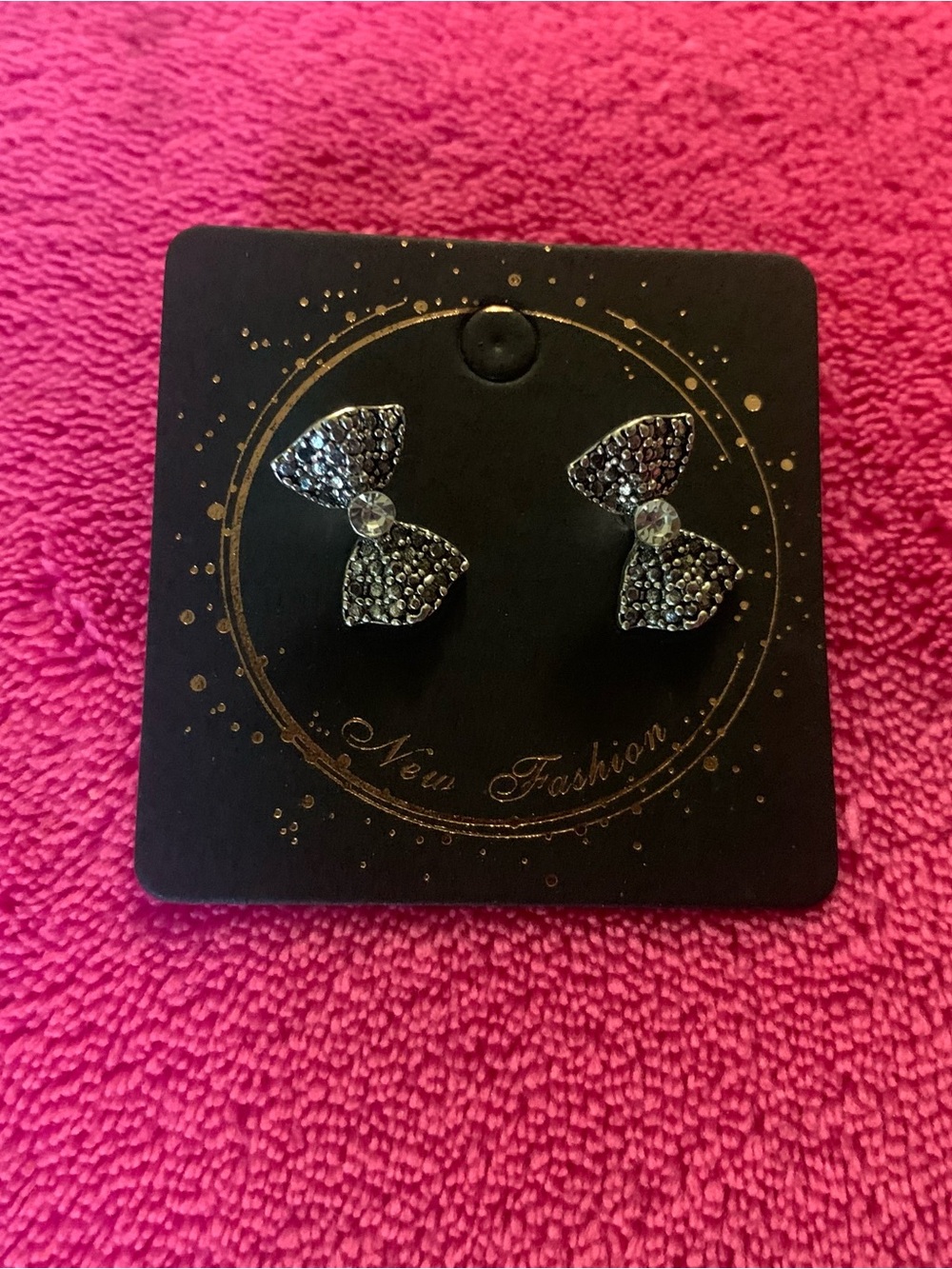 Crystal Bow Stud Earrings in Silver Tone